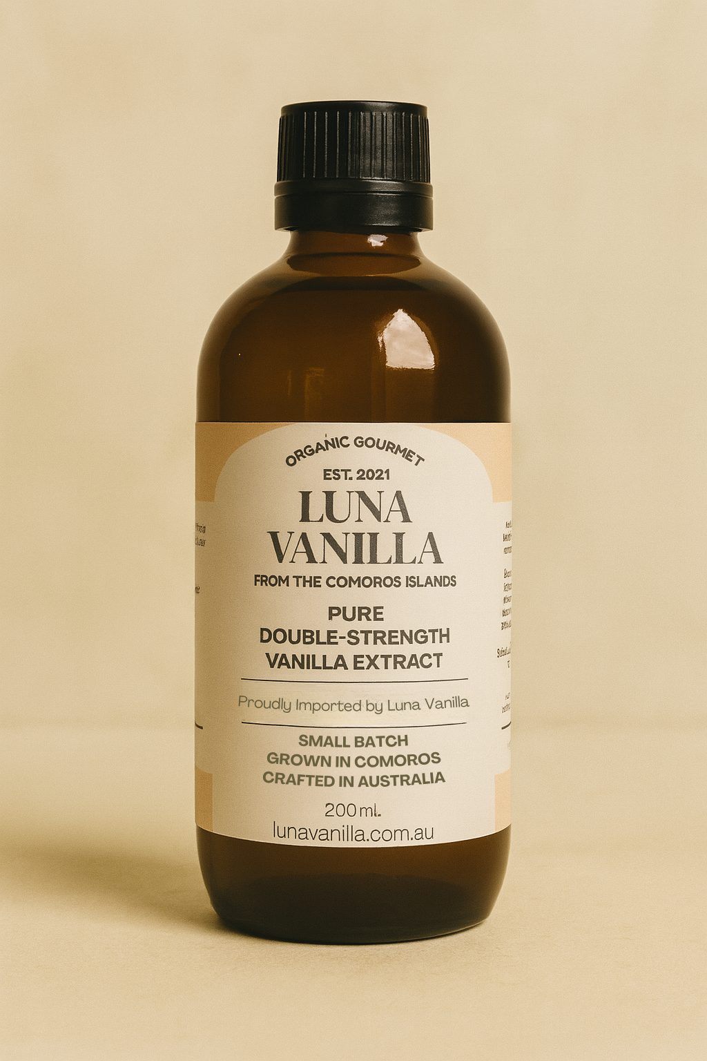Bottle of Luna Vanilla vanilla extract on a beige background, - Luna Vanilla Bean Extract | Luna Vanilla Beans | Buy Vanilla Australia | Gourmet Bourbon Vanilla Beans | Buy Comoros Vanilla Beans | Vanilla Extract 