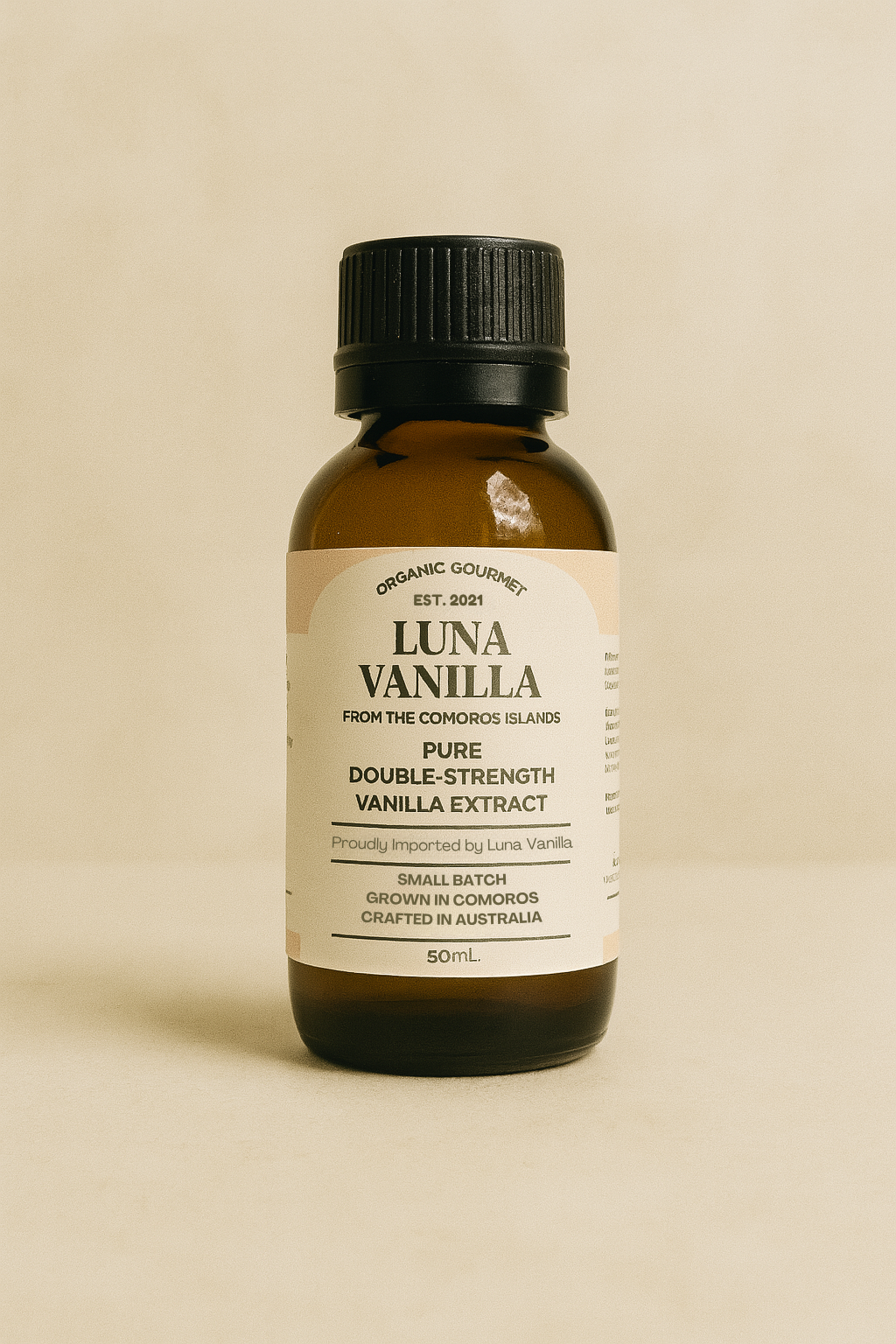 Bottle of Luna Vanilla vanilla extract on a beige background, - Luna Vanilla Bean Extract | Luna Vanilla Beans | Buy Vanilla Australia | Gourmet Bourbon Vanilla Beans | Buy Comoros Vanilla Beans | Vanilla Extract 