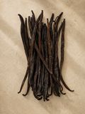 100g of luna vanilla extract grade vanilla beans on a beige background