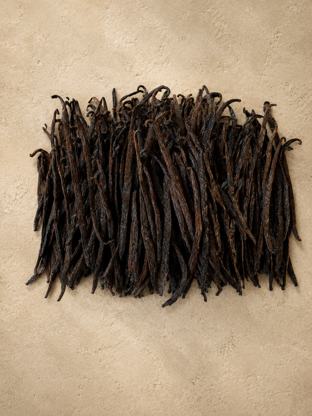 1kg of luna vanilla extract grade vanilla beans on a beige background