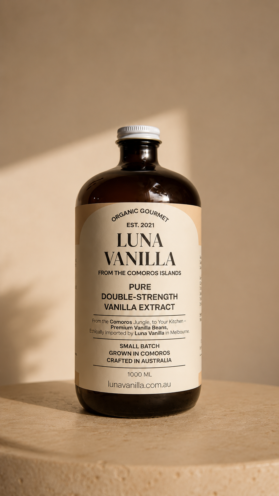 Luna Vanilla 1 litre vanilla extract bottle on a beige background